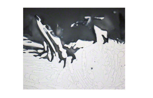Fig. 5 Corrosion: Selective attack (micrograph)