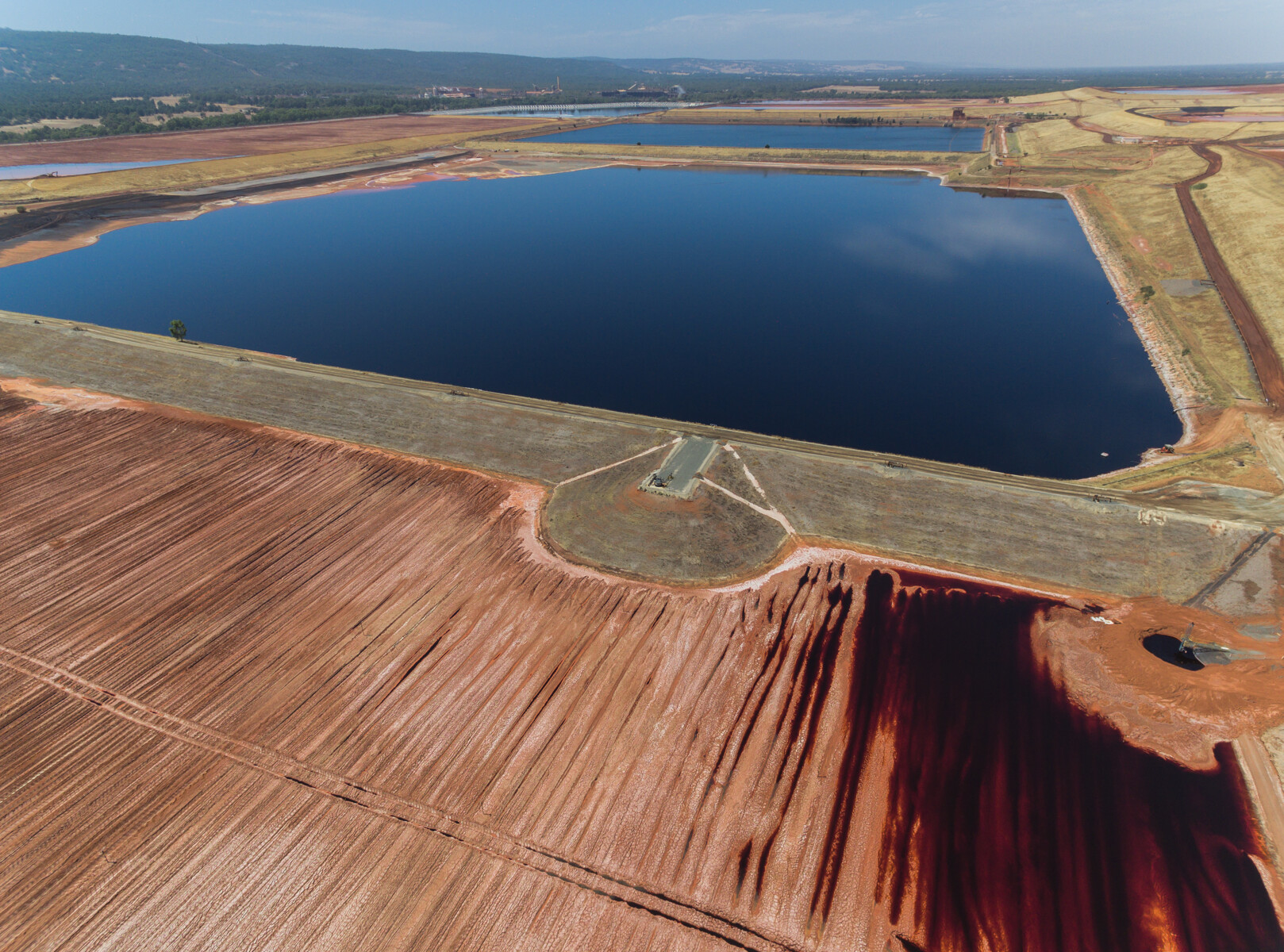 Quarry lake and settling tank