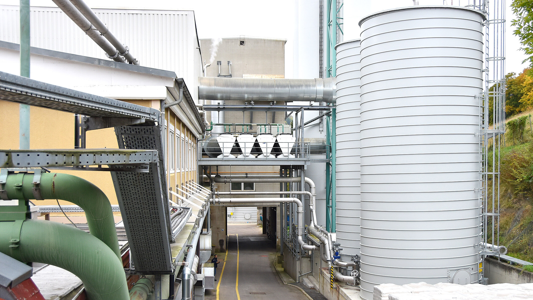 Silo tanks, pipelines, factory building of Ahlstrom-Munksjö (outside view)