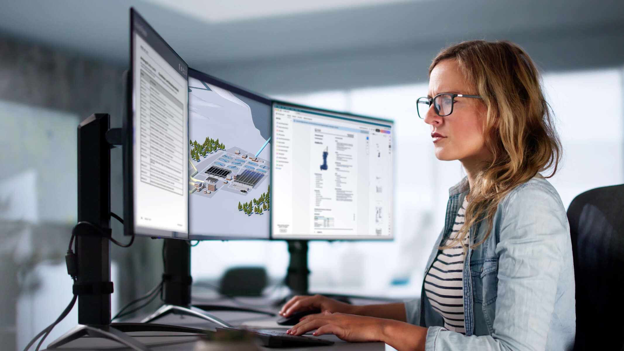 Un employé de KSB travaillant devant un ordinateur sur lequel s'affiche l'outil de conception de KSB