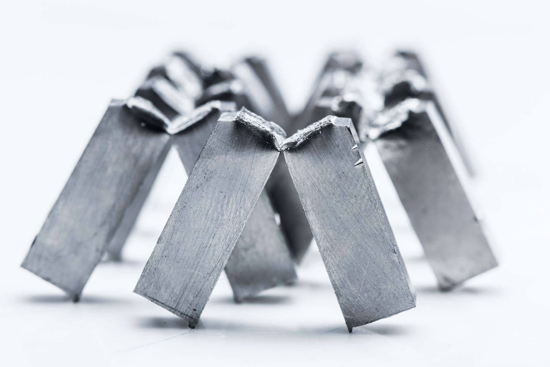 Steel specimens following mechanical materials testing by means of a notched bar impact bending test.