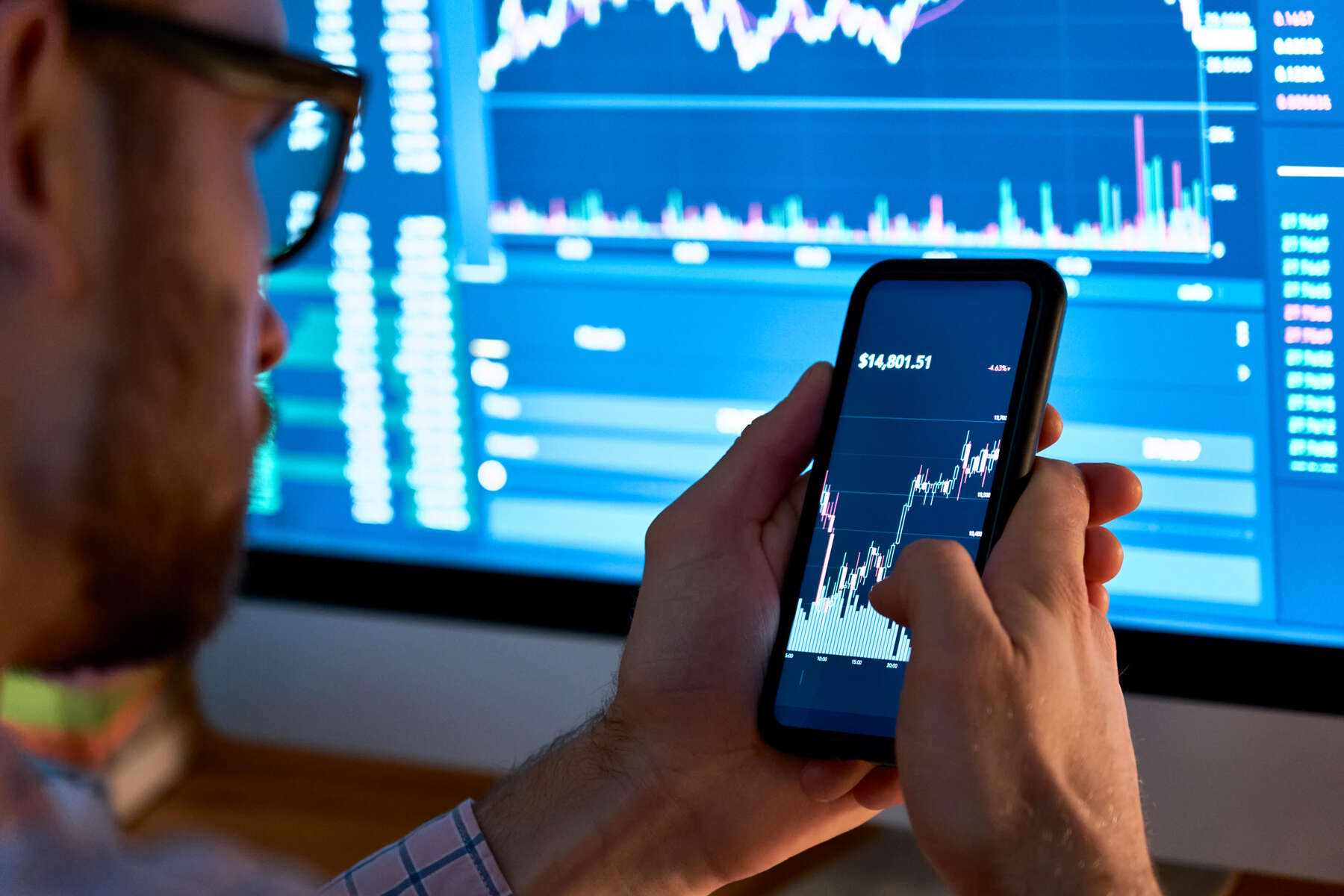 A shareholder checks share prices on a PC.