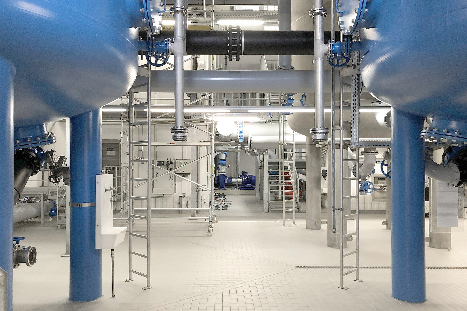 Filter vessels, pipes and valves in the technical installation building of the central “Krug von Nidda” waterworks