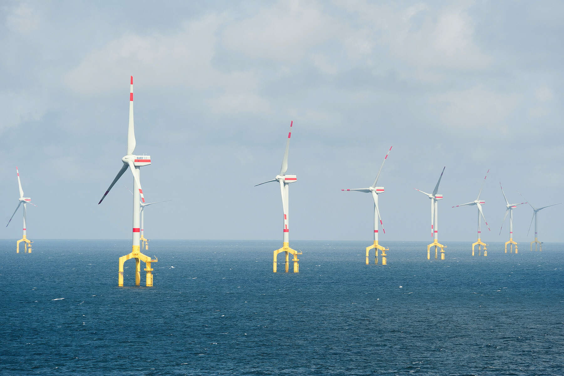 Several wind turbines of the BARD Offshore1 wind park in the North Sea