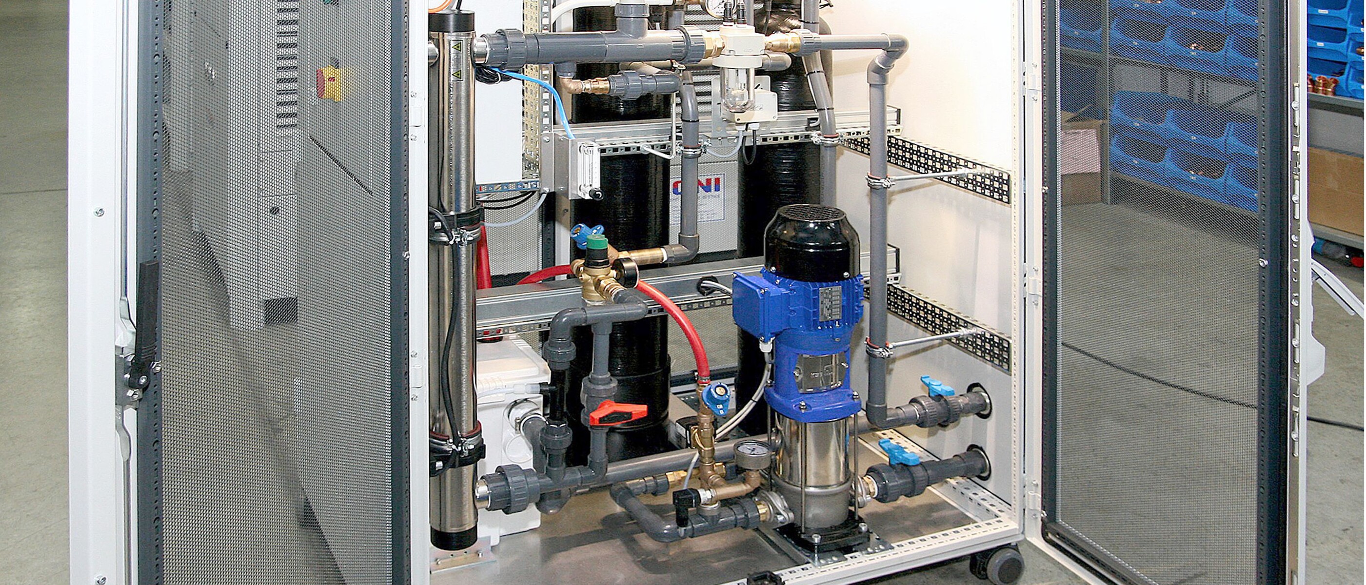 An opened ONI-AquaClean filter flushing station with piping and KSB pump